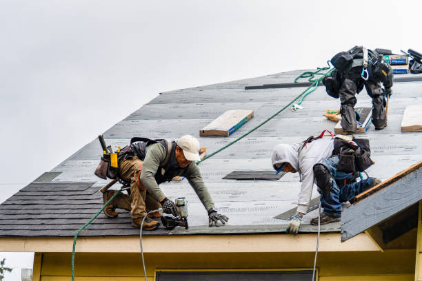 Professional Gutter Installation technician working in Wareham, MA